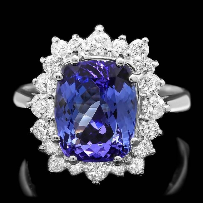 14k Gold 5.00ct Tanzanite 0.90ct Diamond Ring: Retail: $11,200.00 ****** 14k Gold 5.00ct Tanzanite 0.90ct Diamond Ring ****** Metal: 14k Solid White Gold / Size: 7.25 / Total Item Weight: 5.5 grams / Country Made: United States / / Main Stone: Tan