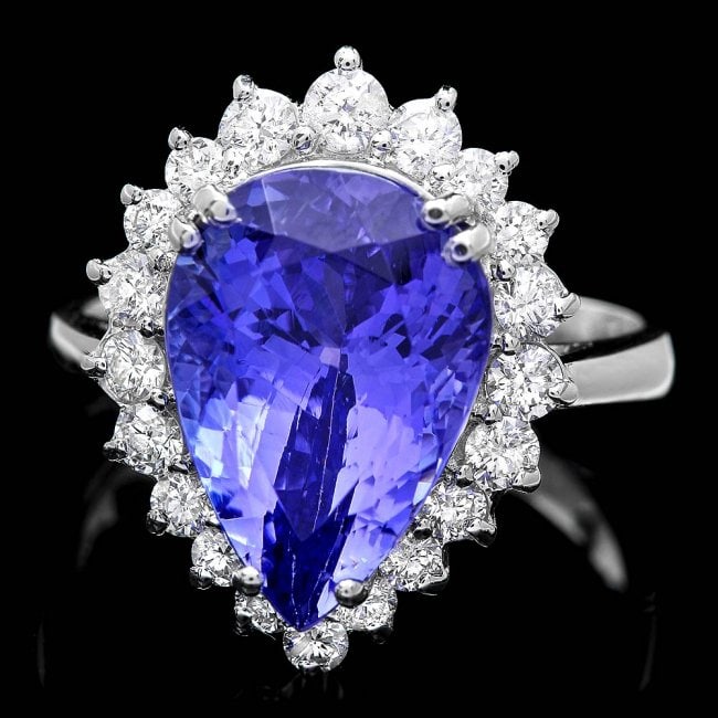 18k Gold 6.00ct Tanzanite 0.80ct Diamond Ring: Retail: $27,860.00 ****** 18k Gold 6.00ct Tanzanite 0.80ct Diamond Ring ****** Metal: 18k Solid White Gold / Size: 7 / Total Item Weight: 6.5 grams / Country Made: United States / / Main Stone: Tanzan