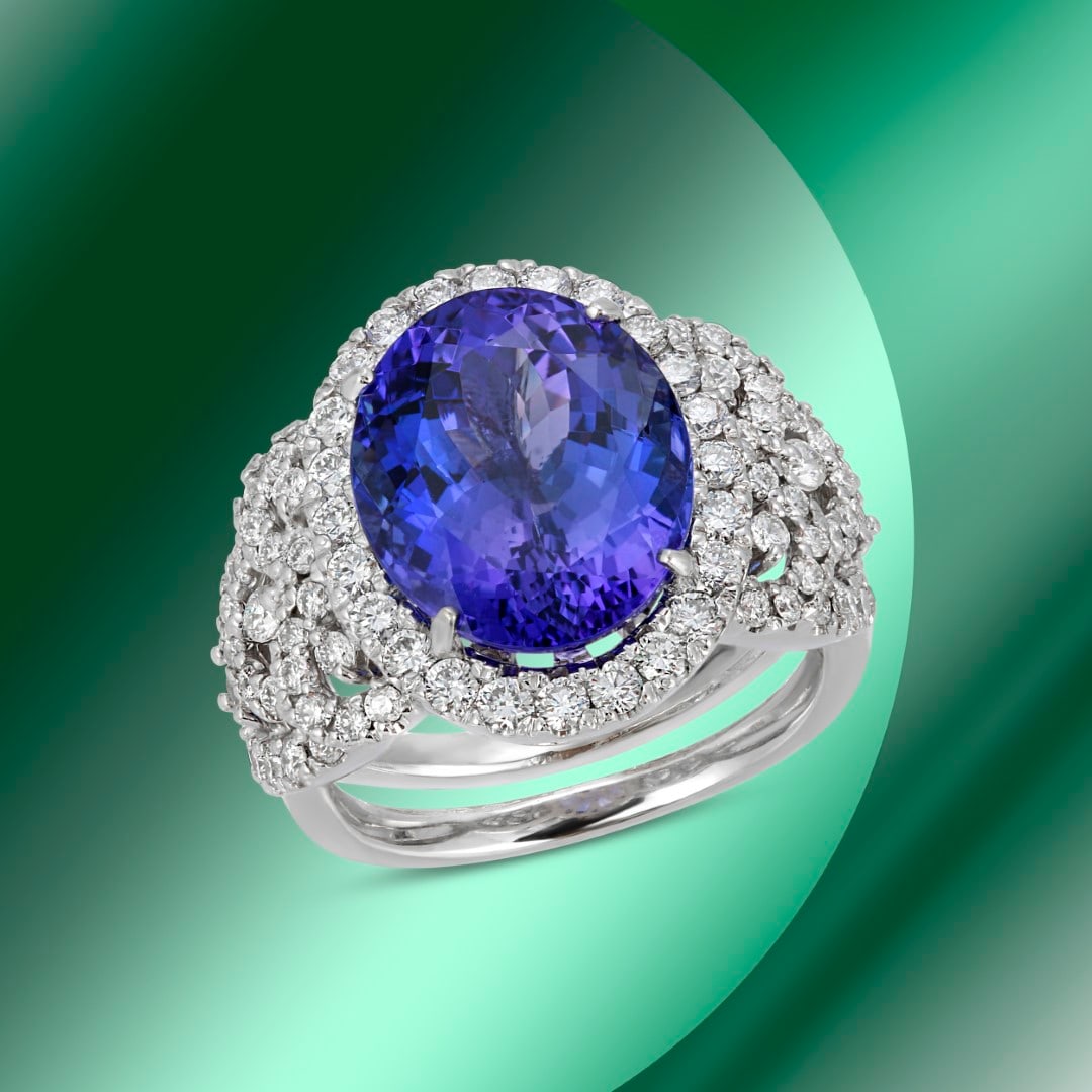 14K Gold 6.70cts Tanzanite & 1.85cts Diamond Ring: Retail: $22,360***** 14K Gold 6.70cts Tanzanite & 1.85cts Diamond Ring****** Metal: 14K White Gold/ Total Wt.: 9.5g/ Country Made USA// Main Stone: Tanzanite/ Carat Total Wt: 6.70cts / Treatment: None