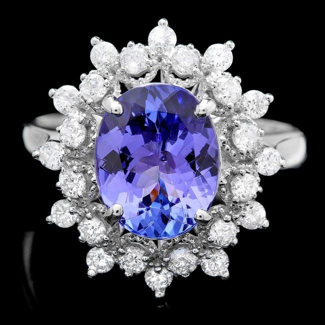 14k Gold 2.60ct Tanzanite 0.65ct Diamond Ring: Retail: $9,750.00 ****** 14k Gold 2.60ct Tanzanite 0.65ct Diamond Ring ****** Metal: 14k Solid White Gold / Size: 7 / Total Item Weight: 4.0 grams / Country Made: United States / / Main Stone: Tanzani