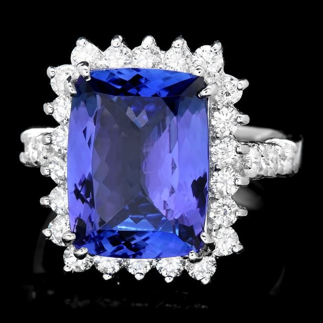 18k Gold 6.50ct Tanzanite 1.10ct Diamond Ring: Retail: $18,500.00 ****** 18k Gold 6.50ct Tanzanite 1.10ct Diamond Ring ****** Metal: 18k Solid White Gold / Size: 6.75 / Total Item Weight: 8.0 grams / Country Made: United States / / Main Stone: Tan
