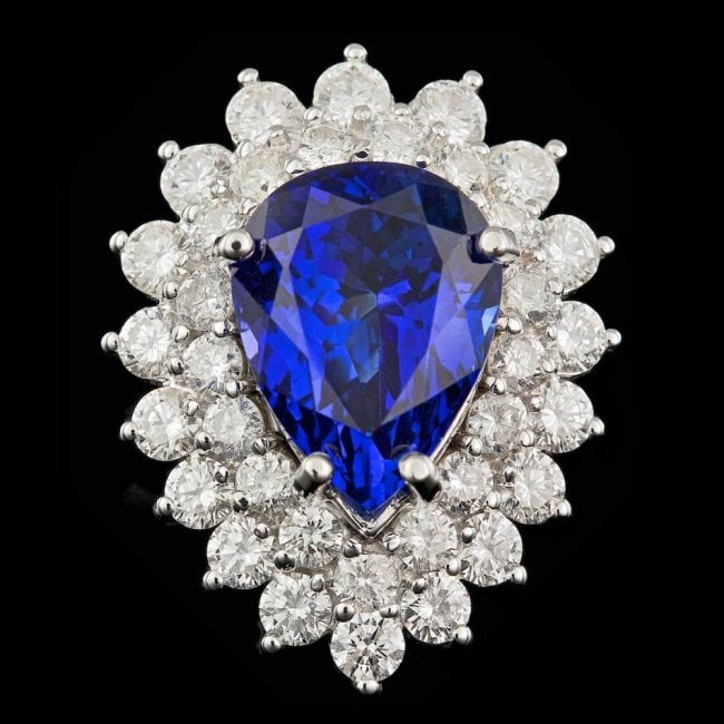 18k Gold 6.50ct Tanzanite 2.40ct Diamond Ring: Retail: $15,400.00 ****** 18k Gold 6.50ct Tanzanite 2.40ct Diamond Ring ****** Metal: 18k Solid White Gold / Size: 7 / Total Item Weight: 11.0 grams / Country Made: United States / / Main Stone: Tanza