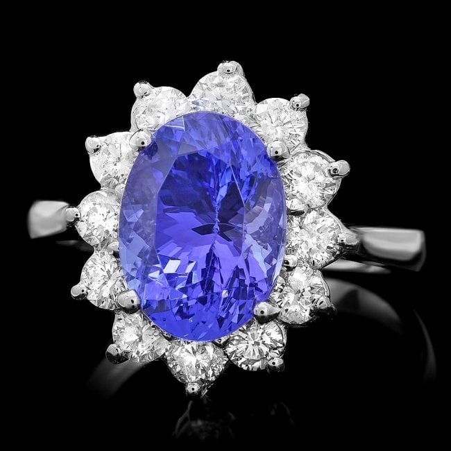 14k Gold 3.50ct Tanzanite 1.00ct Diamond Ring: Retail: $9,850.00 ****** 14k Gold 3.50ct Tanzanite 1.00ct Diamond Ring ****** Metal: 14k Solid White Gold / Size: 6.75 / Total Item Weight: 4.5 grams / Country Made: United States / / Main Stone: Tanz