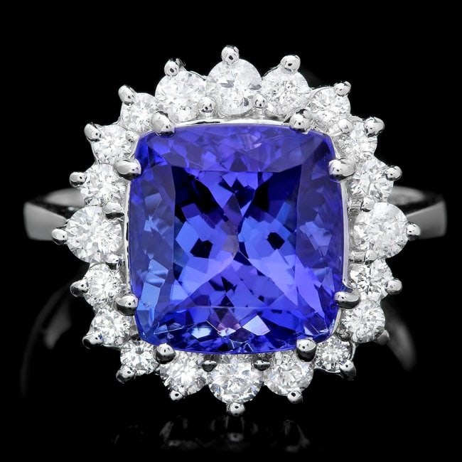 14k Gold 6.00ct Tanzanite 0.70ct Diamond Ring: Retail: $14,560.00 ****** 14k Gold 6.00ct Tanzanite 0.70ct Diamond Ring ****** Metal: 14k Solid White Gold / Size: 6.75 / Total Item Weight: 5.0 grams / Country Made: United States / / Main Stone: Tan