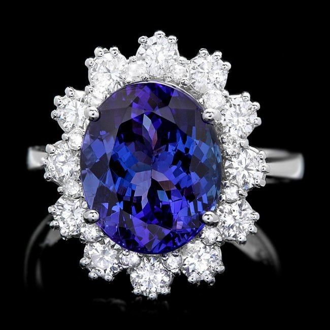 14k Gold 5.00ct Tanzanite 1.20ct Diamond Ring: Retail: $15,380.00 ****** 14k Gold 5.00ct Tanzanite 1.20ct Diamond Ring ****** Metal: 14k Solid White Gold / Size: 7 / Total Item Weight: 6.0 grams / Country Made: United States / / Main Stone: Tanzan