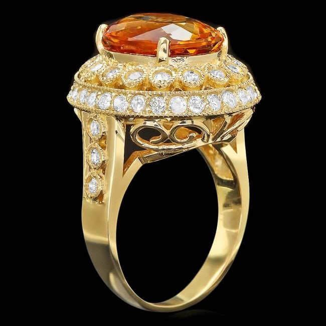14k Gold 6.00ct Citrine 1.35ct Diamond Ring: Retail: $8,850.00 ****** 14k Gold 6.00ct Citrine 1.35ct Diamond Ring ****** Metal: 14k Solid Yellow Gold / Size: 7.5 / Total Item Weight: 8.9 grams / Country Made: United States / / Main Stone: Citrin