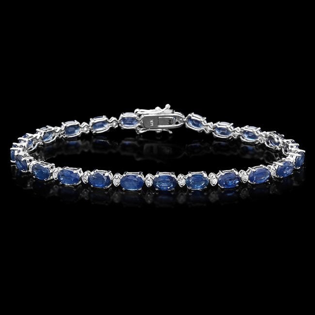 14k Gold 12ct Sapphire 0.54ct Diamond Bracelet: Retail: $7,400.00 ****** 14k Gold 12ct Sapphire 0.54ct Diamond Bracelet ****** Metal: 14k Solid White Gold / Size: 7.75 / Total Item Weight: 9.2 grams / Country Made: United States / / Main Stone: Sap