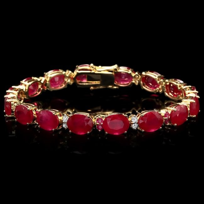 14k Gold 39.7ct Ruby 0.70ct Diamond Bracelet: Retail: $16,300.00 ****** 14k Gold 39.7ct Ruby 0.70ct Diamond Bracelet ****** Metal: 14k Solid Yellow Gold / Size: 7.5 / Total Item Weight: 22.00 grams / Country Made: United States / / Main Stone: Ru