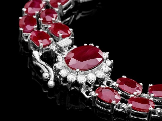 14k White Gold 28ct Ruby 0.50ct Diamond Bracelet: Retail: $17,650.00 ****** 14k White Gold 28ct Ruby 0.50ct Diamond Bracelet ****** Metal: 14k Solid White Gold / Size: 7 / Total Item Weight: 20.0 grams / Country Made: United States / / Main Stone: Ru