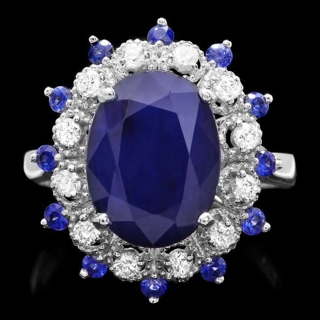 14k Gold 5.35ct Sapphire 0.35ct Diamond Ring: Retail: $4,800.00 ****** 14k Gold 5.35ct Sapphire 0.35ct Diamond Ring ****** Metal: 14k Solid White Gold / Size: 7.5 / Total Item Weight: 5.00 grams / Country Made: United States / / Main Stone: Sapph