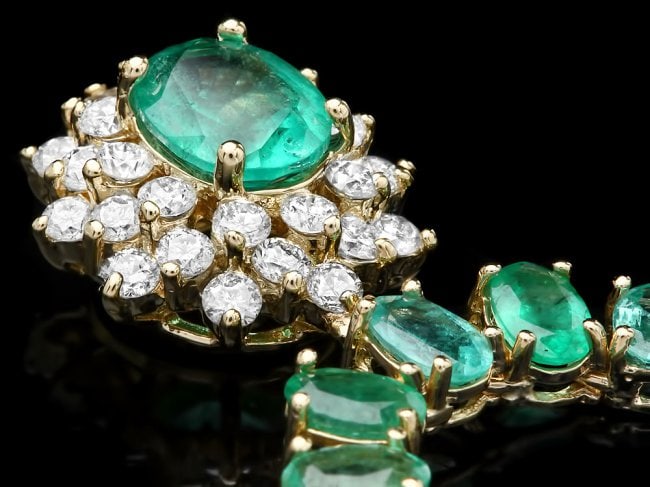 14k Gold 42.2ct Emerald 1.50ct Diamond Necklace: Retail: $36,500.00 ****** 14k Gold 42.2ct Emerald 1.50ct Diamond Necklace ****** Metal: 14k Solid Yellow Gold / Size: 17 / Total Item Weight: 34.5 grams / Country Made: United States / / Main Stone: E