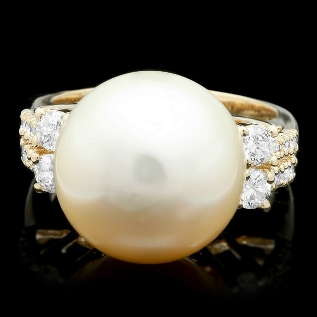 14k Yellow Gold 14 Mm Pearl 0.60ct Diamond Ring: Retail: $6,200.00 ****** 14k Yellow Gold 14 Mm Pearl 0.60ct Diamond Ring ****** Metal: 14k Solid Yellow Gold / Size: 7 / Total Item Weight: 9.5 grams / Country Made: United States / / Main Stone: Pear