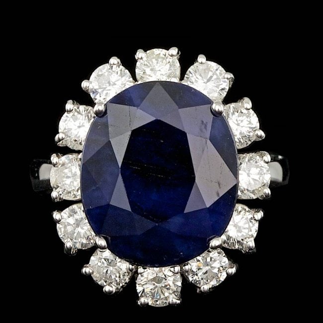 14k Gold 9.00ct Sapphire 1.80ct Diamond Ring: Retail: $16,400.00 ****** 14k Gold 9.00ct Sapphire 1.80ct Diamond Ring ****** Metal: 14k Solid White Gold / Size: 7 / Total Item Weight: 8.0 grams / Country Made: United States / / Main Stone: Sapphir