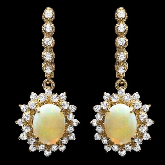 14k Gold 2.50ct Opal 1.85ct Diamond Earrings: Retail: $9,850.00 ****** 14k Gold 2.50ct Opal 1.85ct Diamond Earrings ****** Metal: 14k Solid Yellow Gold / Total Item Weight: 7.5 grams / Country Made: United States / / Main Stone: Opal / Color: Mul