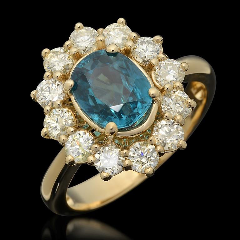 14k Gold 2.76ct Zircon 1.25ct Diamond Ring: Retail: $7,510.00******14k Gold Zircon & Diamond Ring****** Metal: 14K Solid Yellow Gold / Total Item Weight: 5.3 grams / Country Made: United States / / Main Stone: Zircon/ Color: Blue / Carat Total