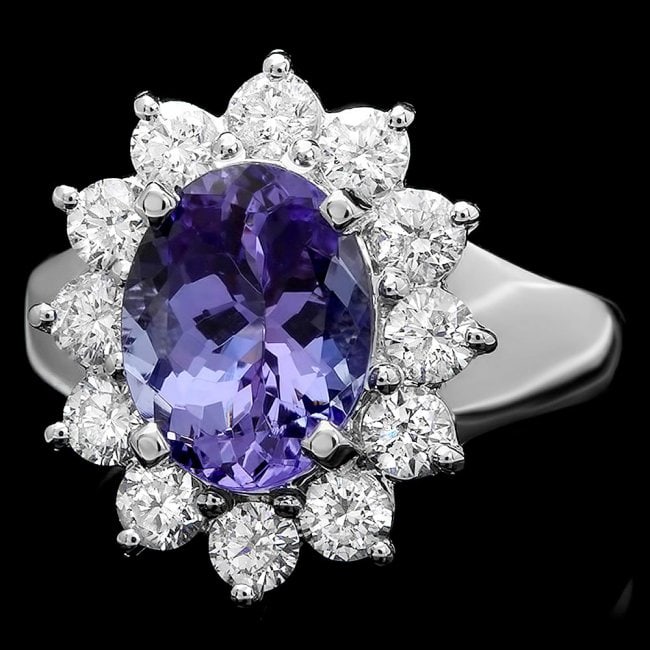 14k White Gold 2.50ct Tanzanite 1ct Diamond Ring: Retail: $9,500.00 ****** 14k White Gold 2.50ct Tanzanite 1ct Diamond Ring ****** Metal: 14k Solid White Gold / Size: 7.5 / Total Item Weight: 5 grams / Country Made: United States / / Main Stone: Tanz