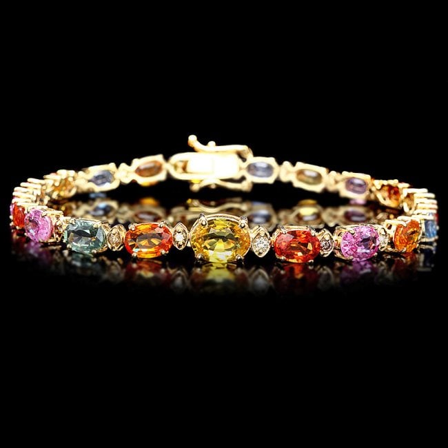 14k Gold 18ct Sapphire .65ct Diamond Bracelet: Retail: $11,900.00 ****** 14k Gold 18ct Sapphire .65ct Diamond Bracelet ****** Metal: 14k Solid Yellow Gold / Size: 7.5 / Total Item Weight: 11.0 grams / Country Made: United States / / Main Stone: Sa