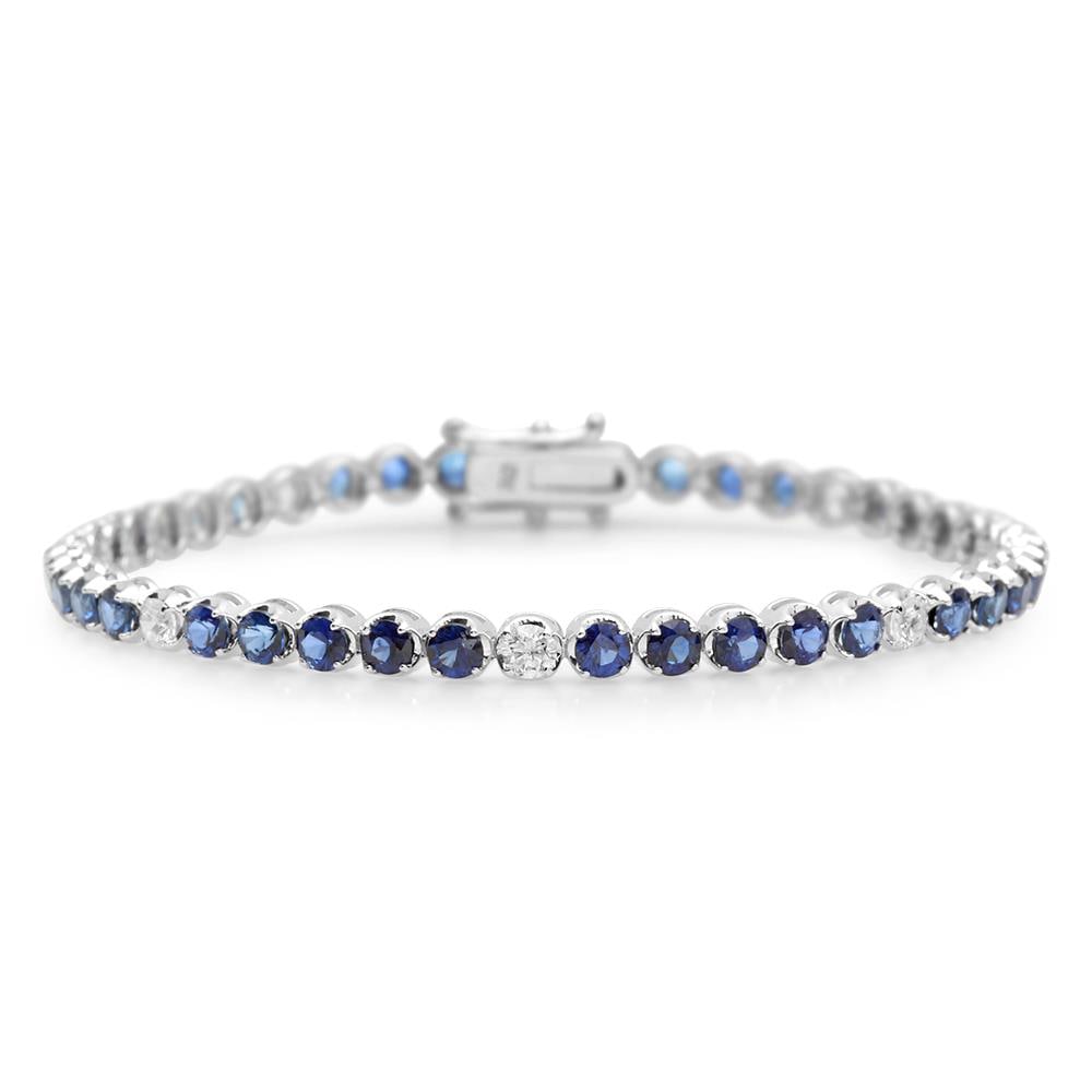 18K Gold 5.75ct Sapphire 0.84cts Diamond Bracelet: Retail: $7,162.00 ******18K Gold 5.75ct Sapphire 0.84cts Diamond Bracelet ****** Metal: 18K White Gold / Total Item Weight: 9.9 grams / Country Made: United States / Main Stone: Sapphire / Color: Blue