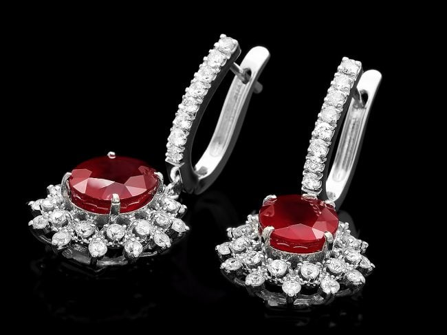 14k Gold 8.00ct Ruby 2.00ct Diamond Earrings: Retail: $8,200.00 ****** 14k Gold 8.00ct Ruby 2.00ct Diamond Earrings ****** Metal: 14k Solid White Gold / Total Item Weight: 8.5 grams / Country Made: United States / / Main Stone: Ruby / Color: Red