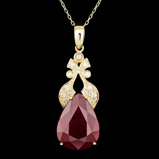 14k Gold 20.00ct Ruby 0.35ct Diamond Pendant: Retail: $6,800.00 ****** 14k Gold 20.00ct Ruby 0.35ct Diamond Pendant ****** Metal: 14k Solid Yellow Gold / Size: 18 / Total Item Weight: 9.5 grams / Country Made: United States / / Main Stone: Ruby /