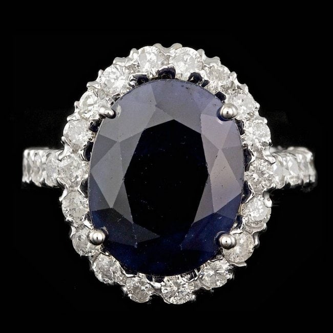 14k Gold 8.50ct Sapphire 1.50ct Diamond Ring: Retail: $13,100.00 ****** 14k Gold 8.50ct Sapphire 1.50ct Diamond Ring ****** Metal: 14k Solid White Gold / Size: 6.75 / Total Item Weight: 7.0 grams / Country Made: United States / / Main Stone: Sapp