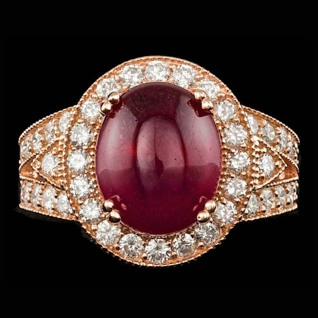14k Rose Gold 9.00ct Ruby 1.55ct Diamond Ring: Retail: $15,600.00 ****** 14k Rose Gold 9.00ct Ruby 1.55ct Diamond Ring ****** Metal: 14k Solid Rose Gold / Size: 7.25 / Total Item Weight: 9.5 grams / Country Made: United States / / Main Stone: Ruby