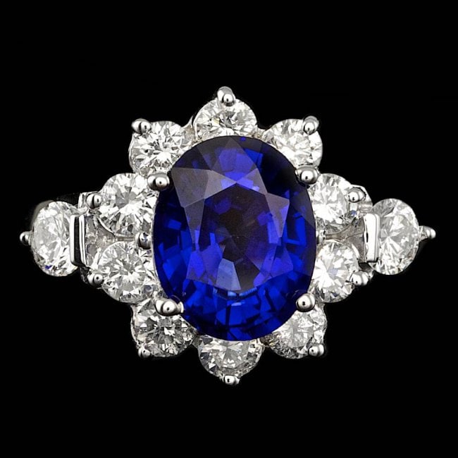 14k Gold 3.00ct Tanzanite 2.50ct Diamond Ring: Retail: $12,800.00 ****** 14k Gold 3.00ct Tanzanite 2.50ct Diamond Ring ****** Metal: 14k Solid White Gold / Size: 6.5 / Total Item Weight: 8.0 grams / Country Made: United States / / Main Stone: