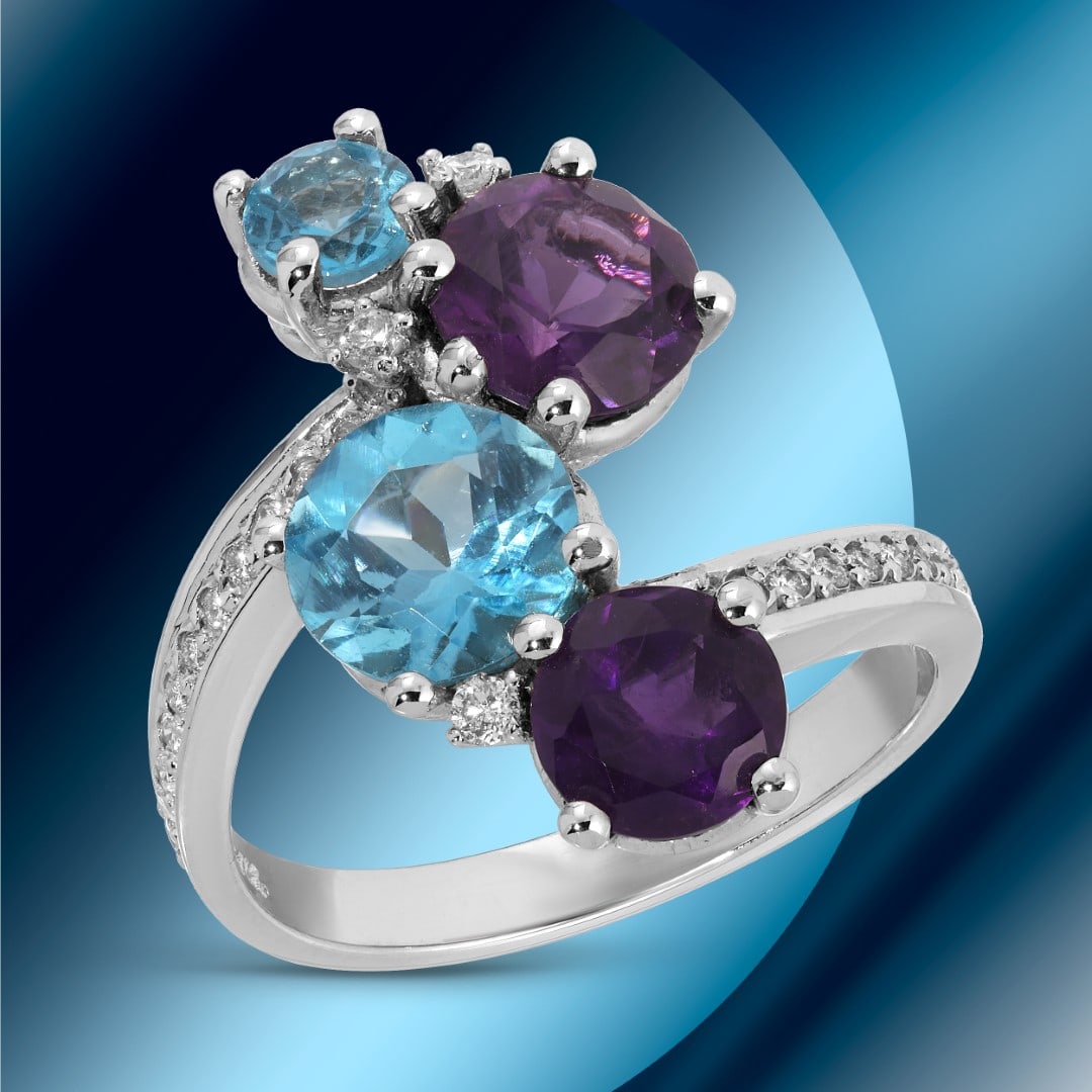 14K Gold 1.18cts Amethyst, 1.42cts Blue Topaz & 0.17cts Diamond Ring: Retail: $4,500*****14K Gold Amethyst, Blue Topaz & Diamond Ring*****Metal: 14K White Gold/ Total Wt.:5.2g / Country Made US// Primary Stone: Amethyst, 1.18cts, Blue Topaz, 1.42cts / Carat Total Wt.: 2