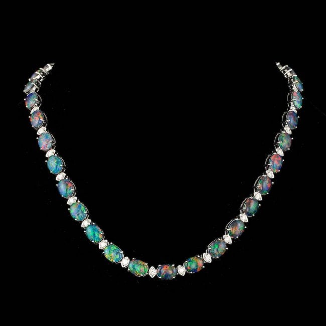 18k Gold 41.00ct Opal 2.55ct Diamond Necklace: Retail: $33,700.00 ****** 18k Gold 41.00ct Opal 2.55ct Diamond Necklace ****** Metal: 18k Solid White Gold / Size: 17 / Total Item Weight: 45.0 grams / Country Made: United States / / Main Stone: Opal