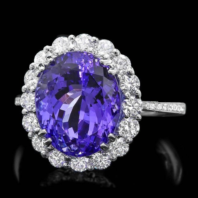 18k Gold 7.50ct Tanzanite 1.00ct Diamond Ring: Retail: $18,300.00 ****** 18k Gold 7.50ct Tanzanite 1.00ct Diamond Ring ****** Metal: 18k Solid White Gold / Size: 7 / Total Item Weight: 5.5 grams / Country Made: United States / / Main Stone: Tanzan