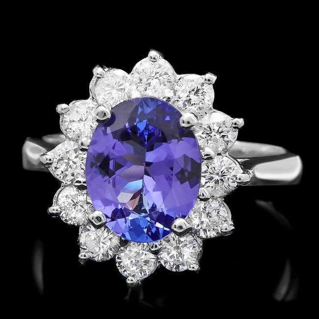 14k Gold 2.10ct Tanzanite 1.00ct Diamond Ring: Retail: $8,900.00 ****** 14k Gold 2.10ct Tanzanite 1.00ct Diamond Ring ****** Metal: 14k Solid White Gold / Size: 7.25 / Total Item Weight: 4.2 grams / Country Made: United States / / Main Stone: Tanz