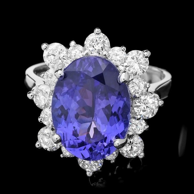 14k Gold 5.50ct Tanzanite 1.40ct Diamond Ring: Retail: $14,600.00 ****** 14k Gold 5.50ct Tanzanite 1.40ct Diamond Ring ****** Metal: 14k Solid White Gold / Size: 7.25 / Total Item Weight: 5.5 grams / Country Made: United States / / Main Stone: Tan