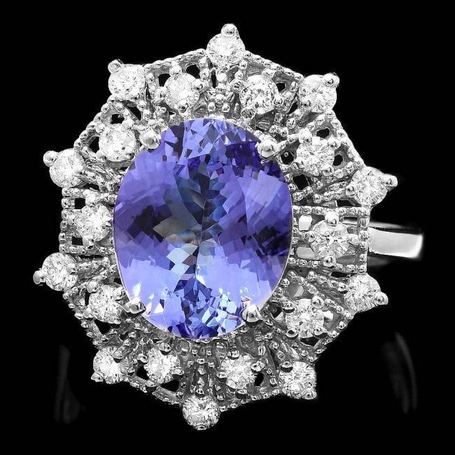 14k Gold 4.00ct Tanzanite 0.70ct Diamond Ring: Retail: $9,500.00 ****** 14k Gold 4.00ct Tanzanite 0.70ct Diamond Ring ****** Metal: 14k Solid White Gold / Size: 8 / Total Item Weight: 6.3 grams / Country Made: United States / / Main Stone: Tanzani