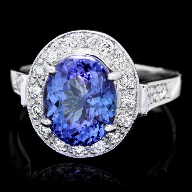 14k Gold 4.00ct Tanzanite 0.50ct Diamond Ring: Retail: $10,300.00 ****** 14k Gold 4.00ct Tanzanite 0.50ct Diamond Ring ****** Metal: 14k Solid White Gold / Size: 7 / Total Item Weight: 5.0 grams / Country Made: United States / / Main Stone: Tanzan