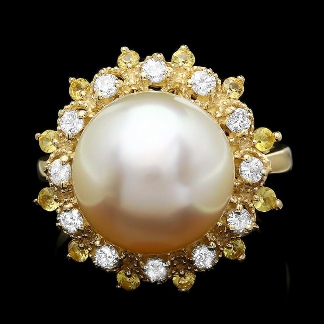 14k Yellow Gold 12mm Pearl 0.40ct Diamond Ring: Retail: $8,000.00 ****** 14k Yellow Gold 12mm Pearl 0.40ct Diamond Ring ****** Metal: 14k Solid Yellow Gold / Size: 7 / Total Item Weight: 7.5 grams / Country Made: United States / / Main Stone: Pearl