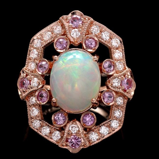 14k Rose Gold 2.85ct Opal 0.60ct Diamond Ring: Retail: $9,800.00 14k Rose Gold 2.85ct Opal 0.60ct Diamond Ring ****** Metal: 14k Solid Rose Gold / Size: 7 / Total Item Weight: 7.5 grams / Country Made: USA / / Main Stone: Opal / Color: Multi-Color