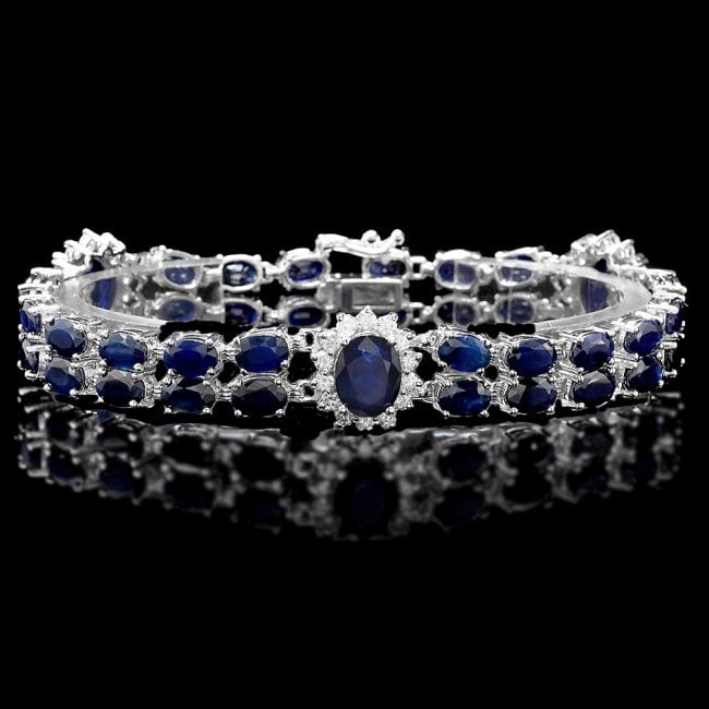 14k Gold 29ct Sapphire 1.75ct Diamond Bracelet: Retail: $23,950.00 ****** 14k Gold 29ct Sapphire 1.75ct Diamond Bracelet ****** Metal: 14k Solid White Gold / Size: 7 / Total Item Weight: 22.0 grams / Country Made: United States / / Main Stone: Sapp