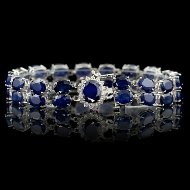 14k Gold 50ct Sapphire 0.65ct Diamond Bracelet: Retail: $14,200.00 ****** 14k Gold 50ct Sapphire 0.65ct Diamond Bracelet ****** Metal: 14k Solid White Gold / Size: 7 / Total Item Weight: 26.0 grams / / Main Stone: Sapphire / Color: Blue / Carat Tot