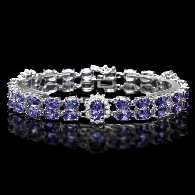 14k W Gold 20ct Tanzanite 1.35ct Diamond Bracelet: Retail: $22,350.00 ****** 14k W Gold 20ct Tanzanite 1.35ct Diamond Bracelet ****** Metal: 14k Solid White Gold / Size: 7 / Total Item Weight: 18.5 grams / Country Made: United States / / Main Stone: T