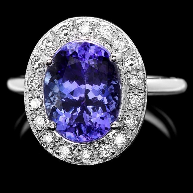 14k Gold 5.00ct Tanzanite 0.40ct Diamond Ring: Retail: $12,100.00 ****** 14k Gold 5.00ct Tanzanite 0.40ct Diamond Ring ****** Metal: 14k Solid White Gold / Size: 7.5 / Total Item Weight: 6.5 grams / Country Made: United States / / Main Stone: Tanz