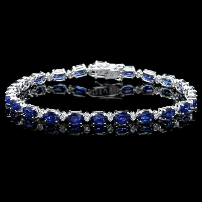 14k Gold 12.00ct Sapphire 0.55ct Diamond Bracelet: Retail: $7,300.00 ****** 14k Gold 12.00ct Sapphire 0.55ct Diamond Bracelet ****** Metal: 14k Solid White Gold / Size: 7 / Total Item Weight: 8.5 grams / Country Made: United States / / Main Stone: Sap