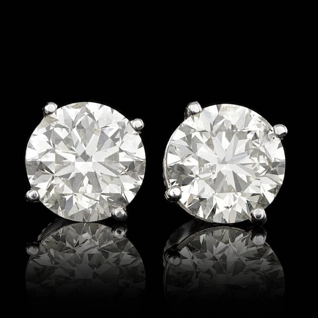 14k White Gold 5.09ct Diamond Earrings: Retail: $94,800.00 ****** 14k White Gold 5.09ct Diamond Earrings ****** Metal: 14k Solid White Gold / Total Item Weight: 2.3 grams / Country Made: United States / / Main Stone: Diamond / Color: White