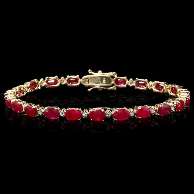14k Gold 13.00ct Ruby 0.55ct Diamond Bracelet: Retail: $8,500.00 ****** 14k Gold 13.00ct Ruby 0.55ct Diamond Bracelet ****** Metal: 14k Solid Yellow Gold / Size: 7.5 / Total Item Weight: 9.2 grams / Country Made: United States / / Main Stone: Ruby