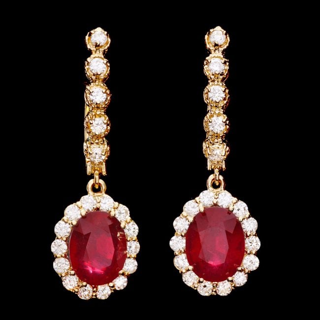 14k Gold 6.50ct Ruby 1.25ct Diamond Earrings: Retail: $8,600.00 ****** 14k Gold 6.50ct Ruby 1.25ct Diamond Earrings ****** Metal: 14k Solid Yellow Gold / Total Item Weight: 5.5 grams / Country Made: United States / / Main Stone: Ruby / Color: Red