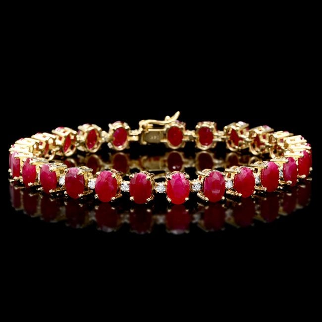 14k Gold 26.00ct Ruby 1.00ct Diamond Bracelet: Retail: $16,700.00 ****** 14k Gold 26.00ct Ruby 1.00ct Diamond Bracelet ****** Metal: 14k Solid Yellow Gold / Size: 7.5 / Total Item Weight: 20 grams / Country Made: United States / / Main Stone: Ruby