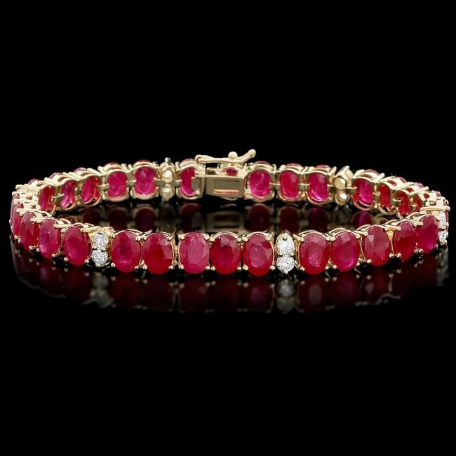14k Gold 30.00ct Ruby 1.25ct Diamond Bracelet: Retail: $16,400.00 ****** 14k Gold 30.00ct Ruby 1.25ct Diamond Bracelet ****** Metal: 14k Solid Yellow Gold / Size: 7.5 / Total Item Weight: 22 grams / Country Made: United States / / Main Stone: Ruby