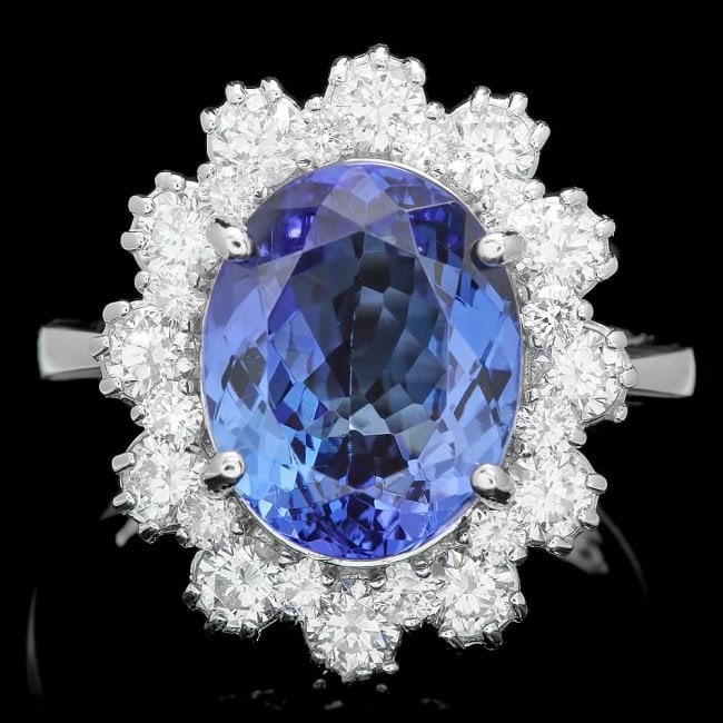 14k Gold 5.50ct Tanzanite 1.30ct Diamond Ring: Retail: $31,700.00 ****** 14k Gold 5.50ct Tanzanite 1.30ct Diamond Ring ****** Metal: 14k Solid White Gold / Size: 6.75 / Total Item Weight: 6.0 grams / Country Made: United States / / Main Stone: Tan