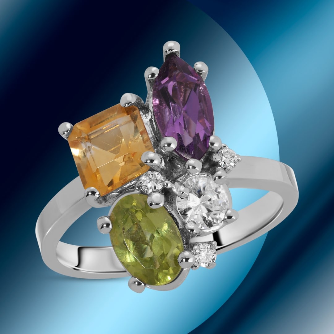 14K Gold 0.45cts Amethyst, 0.70cts Citrine, 0.58cts Peridot & 0.05cts Diamond Ring: Retail: $3,575*****14K Gold Amethyst, Citrine, Peridot & Diamond Ring*****Metal: 14K White Gold/ Total Wt.:4.5g / Country Made US// Primary Stone: Amethyst, 0.45cts, Citrine, 0.70cts, Peridot, 0.58cts