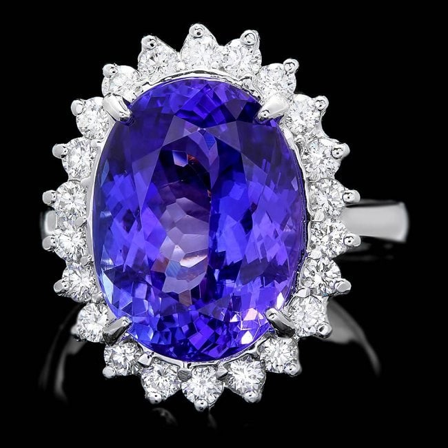 14k Gold 10.00ct Tanzanite 0.90ct Diamond Ring: Retail: $23,800.00 ****** 14k Gold 10.00ct Tanzanite 0.90ct Diamond Ring ****** Metal: 14k Solid White Gold / Size: 7.25 / Total Item Weight: 8.0 grams / Country Made: United States / / Main Stone: Ta