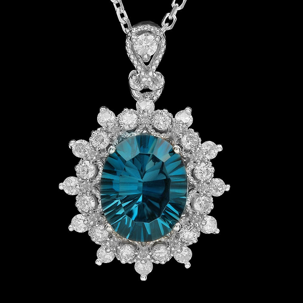 14K Gold 2.89ct Topaz 0.55ct Diamond Pendant: Retail: $2,692.00 ****** 14K Gold 2.89ct Topaz 0.55ct Diamond Pendant ****** Metal: 14K Solid Gold / Total Item Weight: 3.1 grams / Country Made: United States / / Main Stone: Topaz / Color: Blue / Ca
